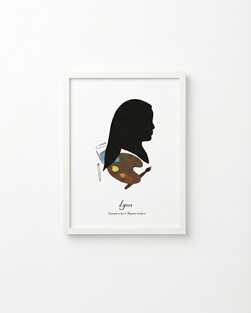 Framed artwork of a silhouette with a colorful design on a white background