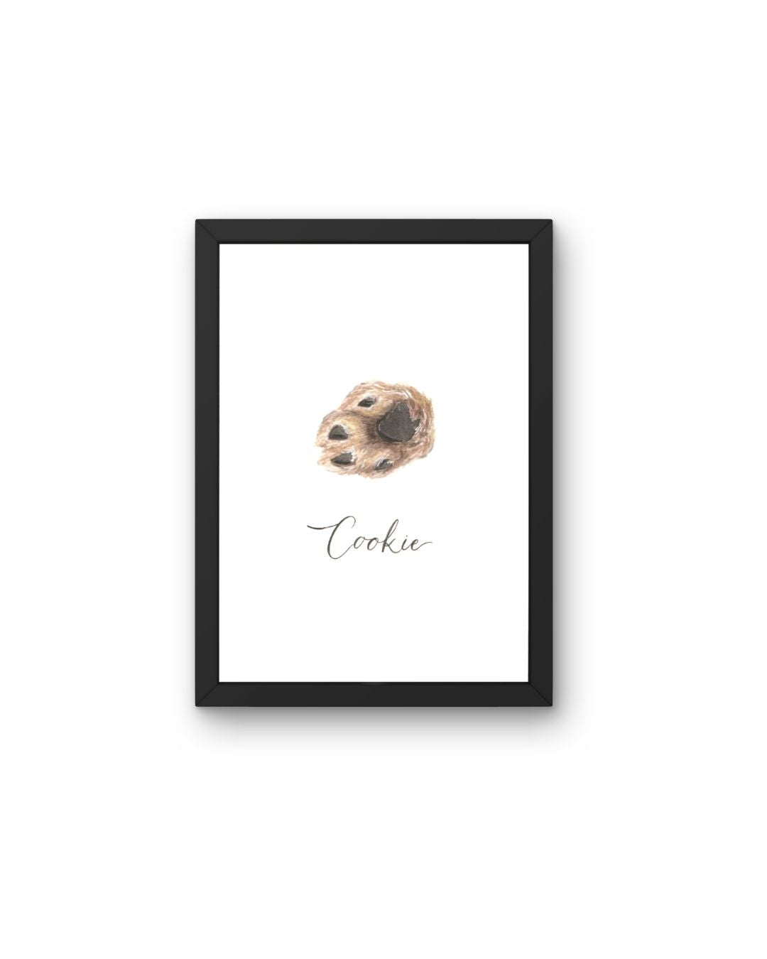 Black framed artwork of a watercolor pet paw painting with 'Cookie' text on a white background