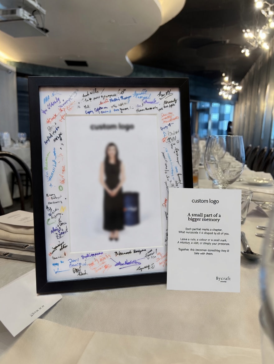 Signature Legacy Portrait with white border filled with team signatures and messages with instruction card