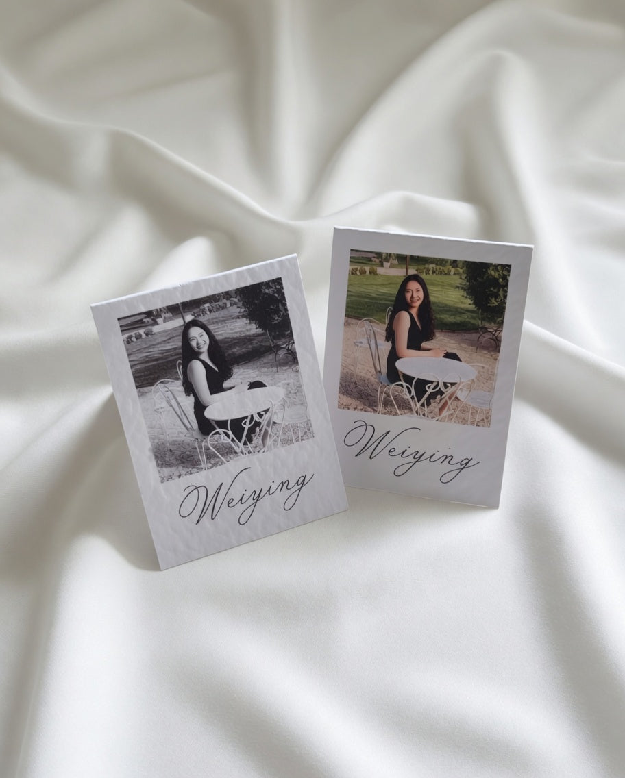 A photo of a lady and hand lettering printed on a tent card