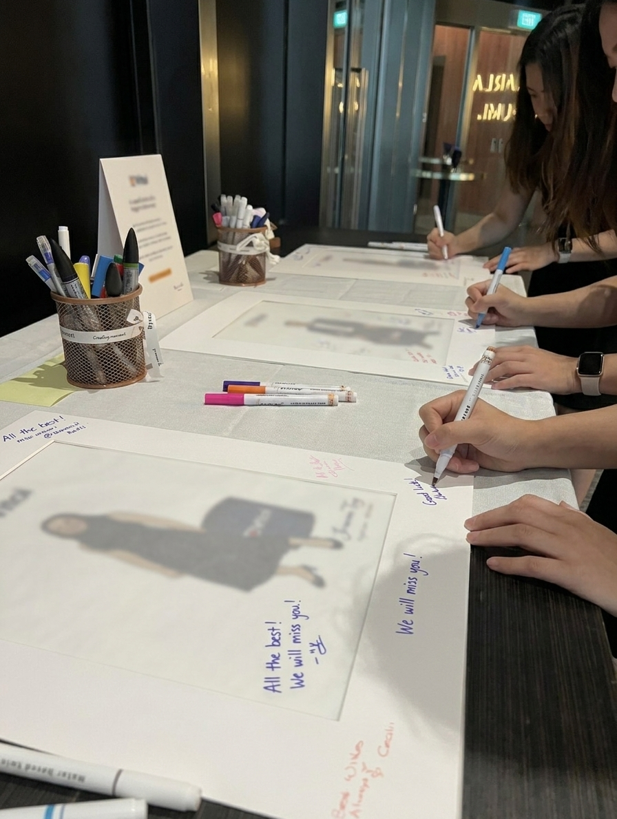 employees writing farewell retirement wishes for gifting