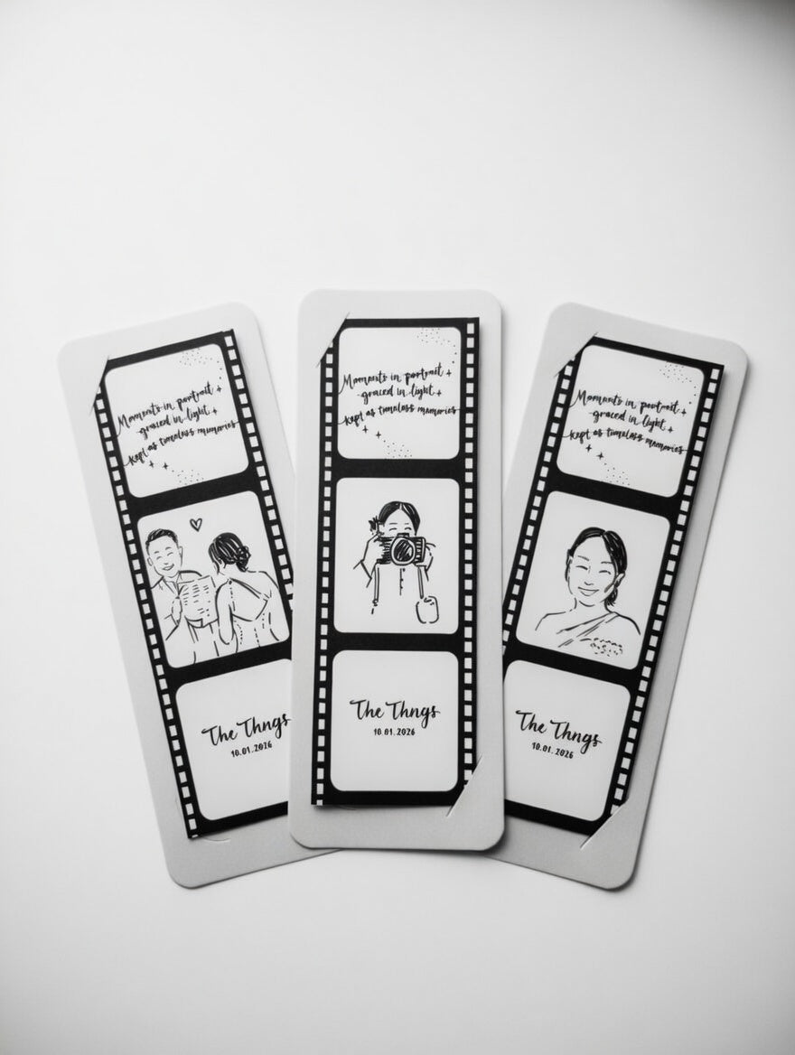 Three black and white photo cards with printed text on a light gray background