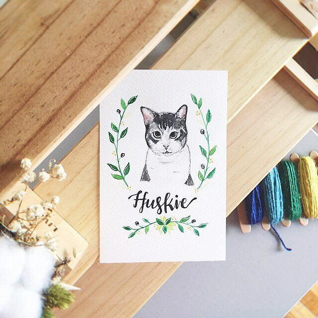 Watercolor portrait illustration of a pet cat with wreath border design.