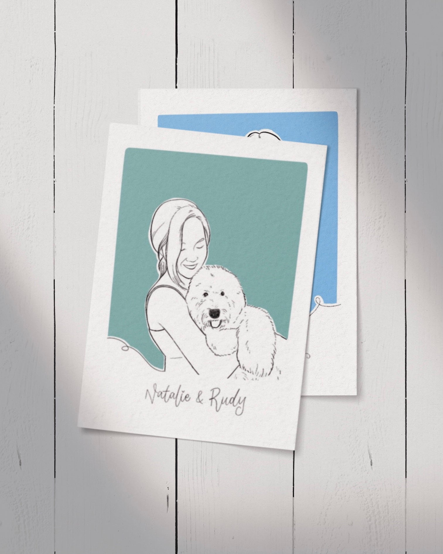 Custom hand-drawn linear portrait illustration of a person with a pet, presented on a wooden surface with a blue background.